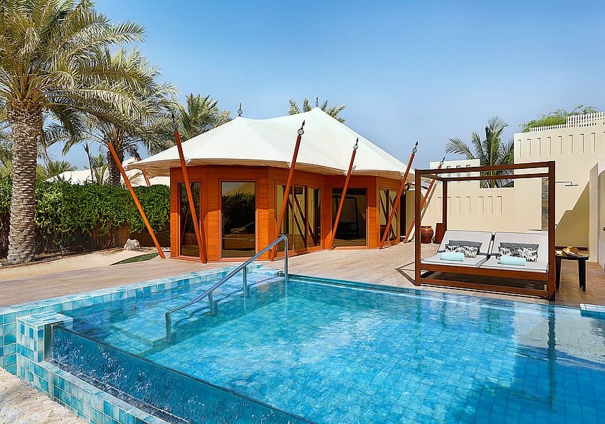 the ritz carlton al hamra beach pool