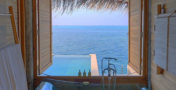 Laamu Water Villa mit Pool Badezimmer - Six Senses Laamu