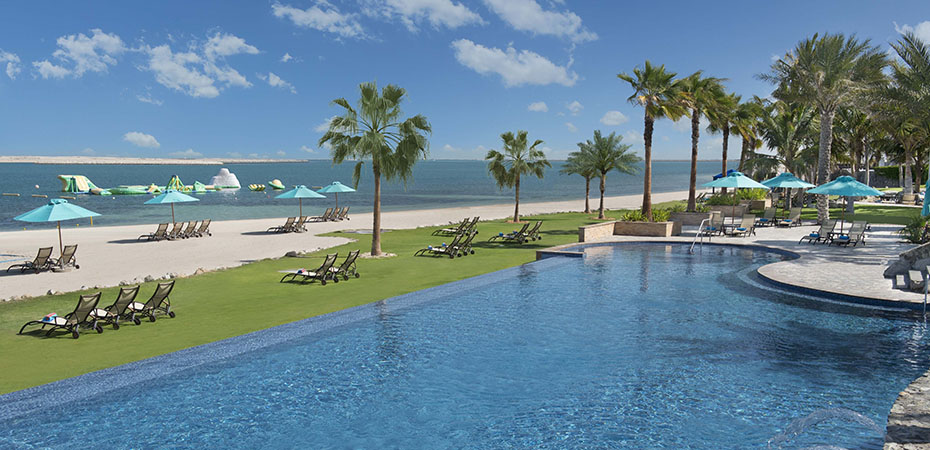 Pool im All Inclusive Hotel JA The Resort - JA Palm Tree Court Dubai
